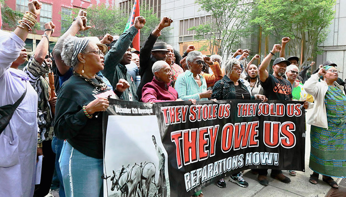 Demonstrators demanding reparations